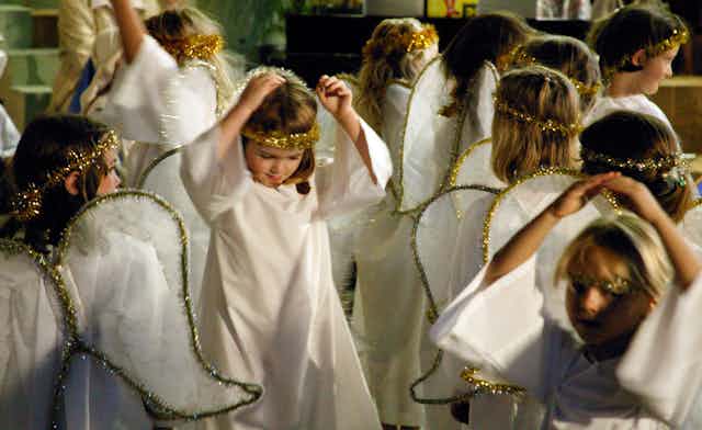 Small girls dressed as angels