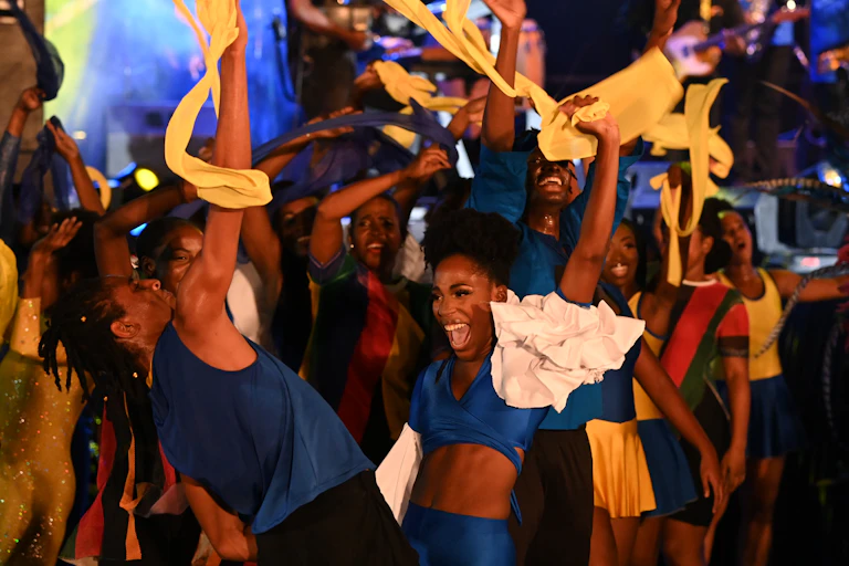 Dancers celebrate the end of British rule in Barbados.