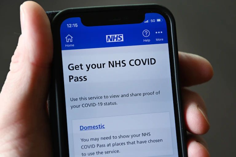 A phone screen showing an NHS COVID pass
