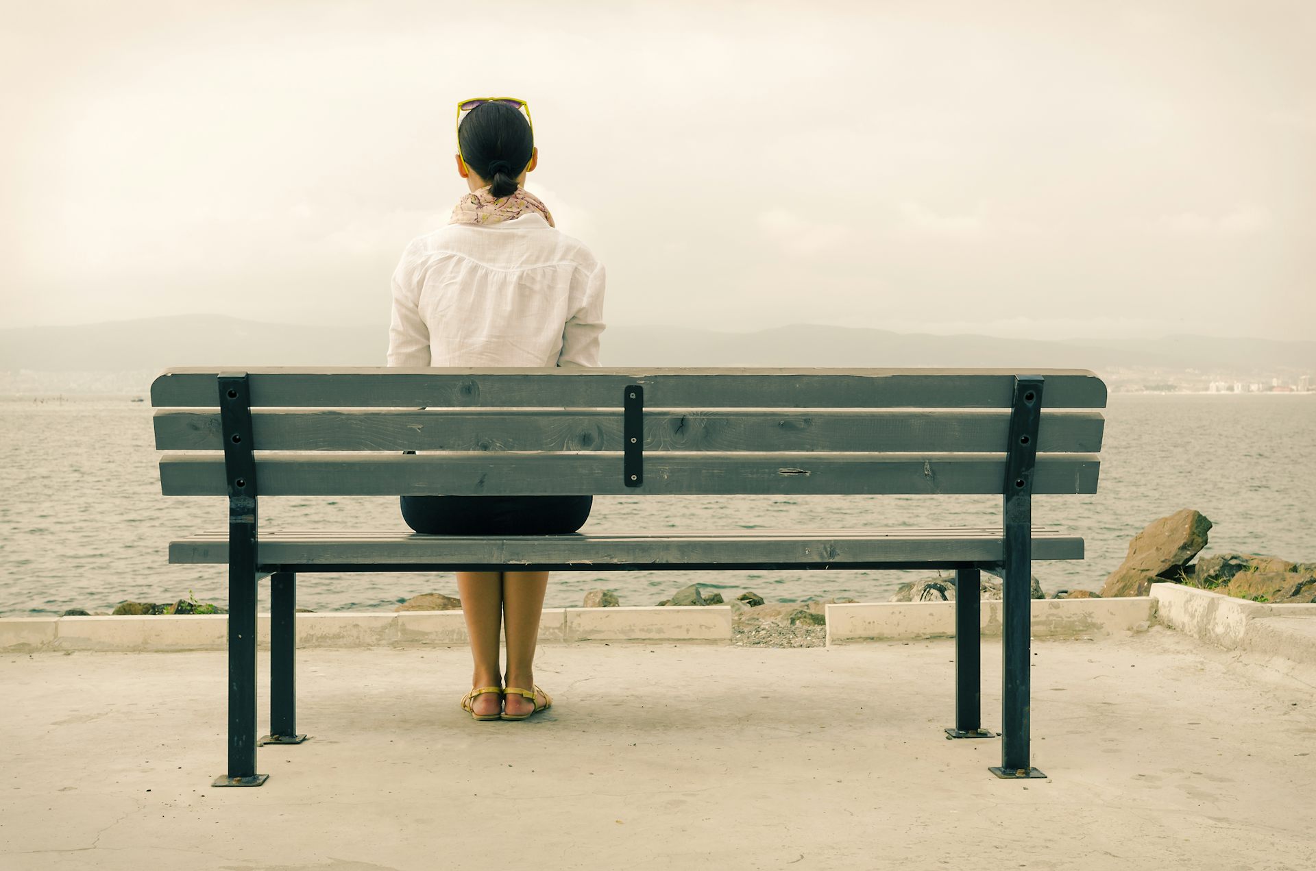 Sad Woman Sitting On Bench Image