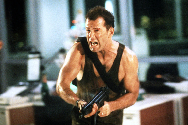Man runs screaming with a gun.