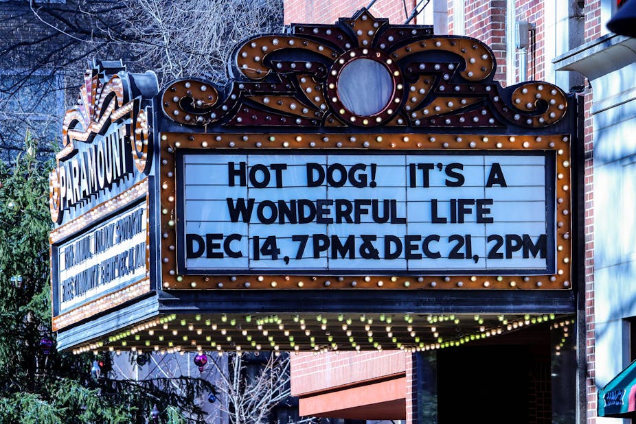An old-fashioned American cinema with It's A Wonderful Life showing.