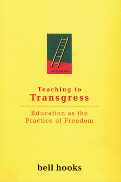 A yellow book cover with a small ladder above the title 'Teaching to Transgress.'