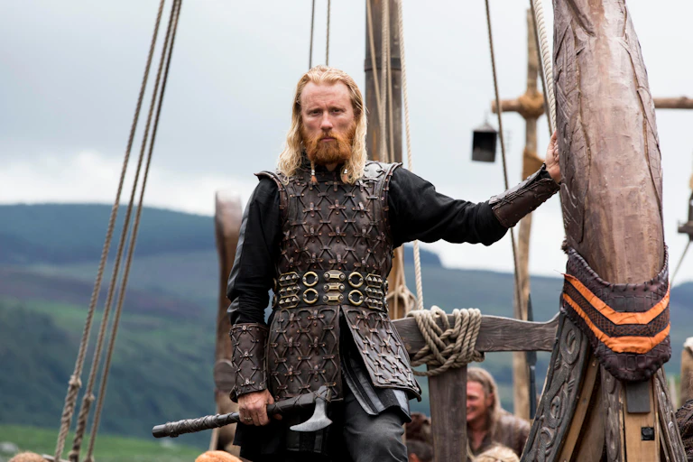 A viking on a ship.