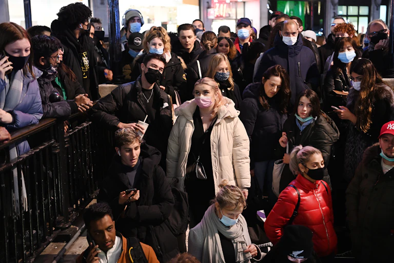 Commuters waiting to enter Oxford Street tube station.