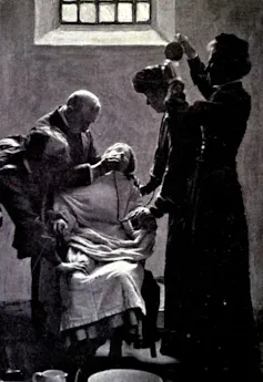 Force feeding a suffragette.