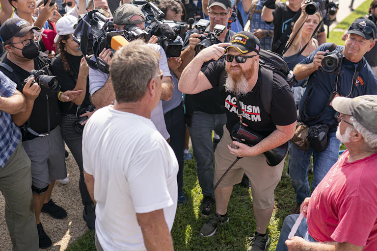 People with different views face off at a demonstration