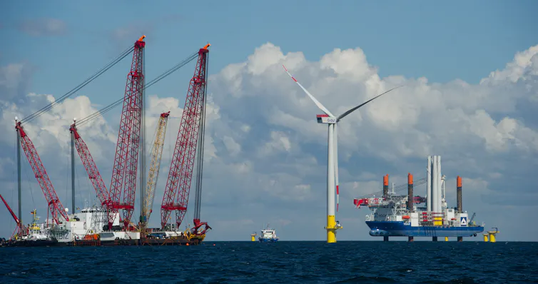 Ships and cranes at sea