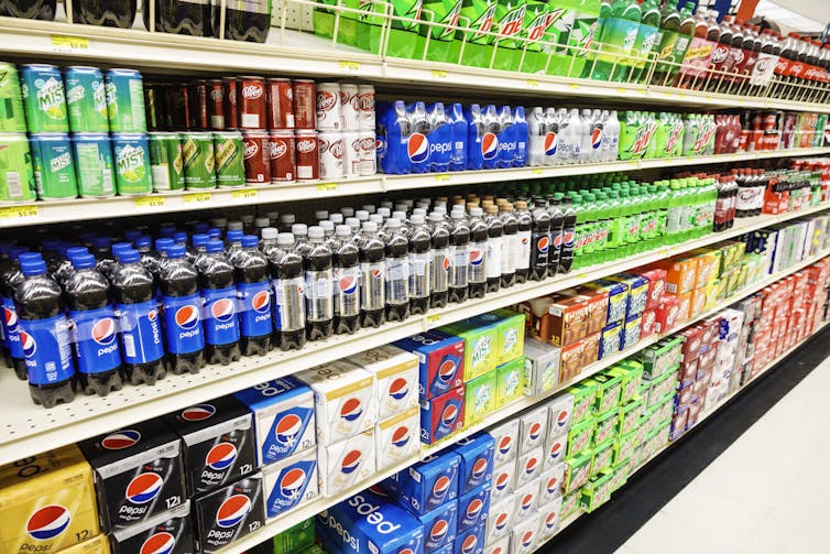 An aisle of soda.