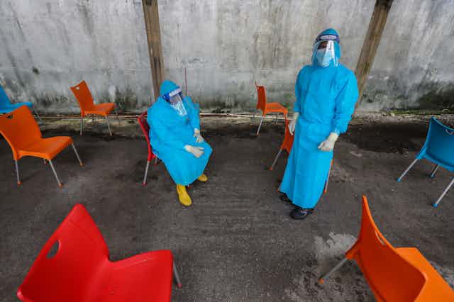 Healthworkers swabbing for omicron in Sri Lanka.