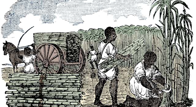 Enslaved people harvesting sugar cane in Louisiana, in 1833.