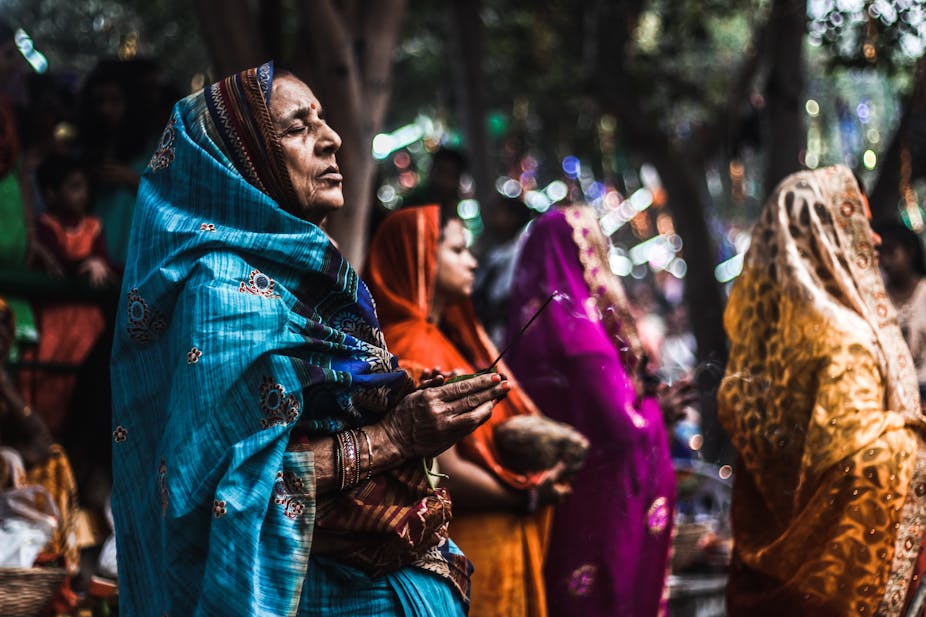 Indian women praying