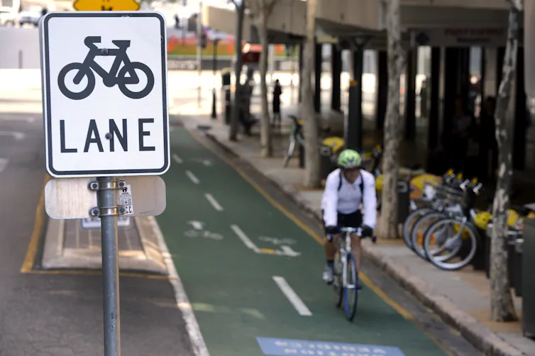 A person rides down a bike lane.