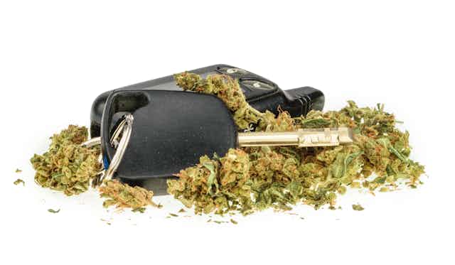 Car keys surrounded by dried cannabis