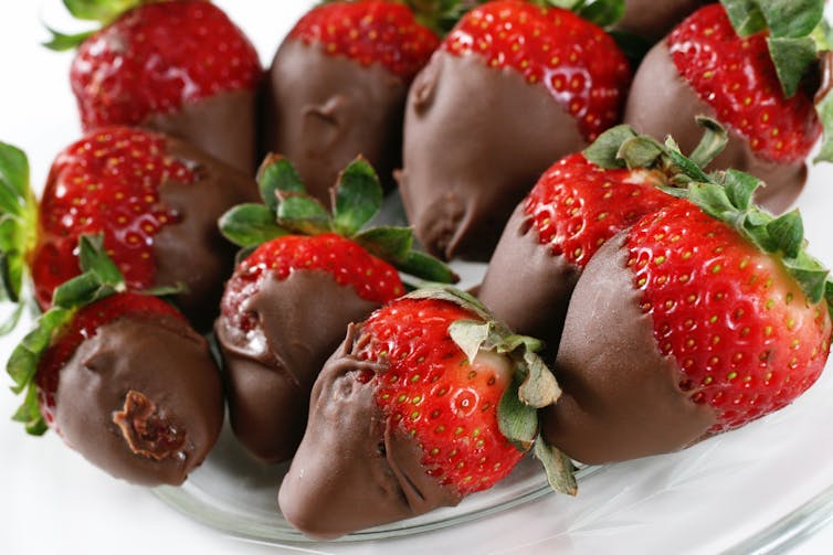A plateful of chocolate-covered strawberries