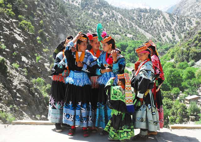 A group of women in colourful clothes.