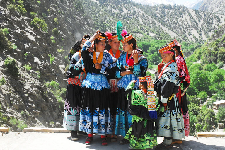 A group of women in colourful clothes.