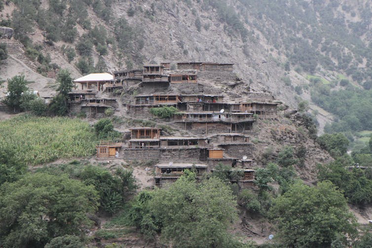 Wooden houses on a mountainside.
