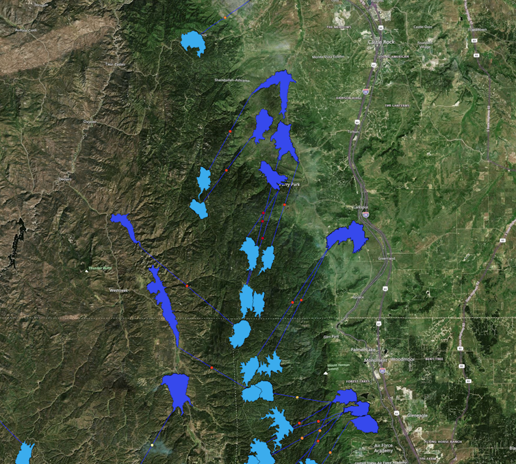 Satellite image showing potential pairings of reservoirs in a mountain area.