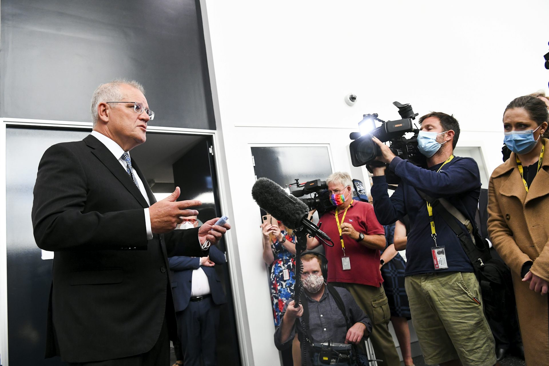 Scott Morrison address the media