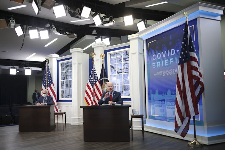 Fauci and Biden on a set for a COVID-19 briefing