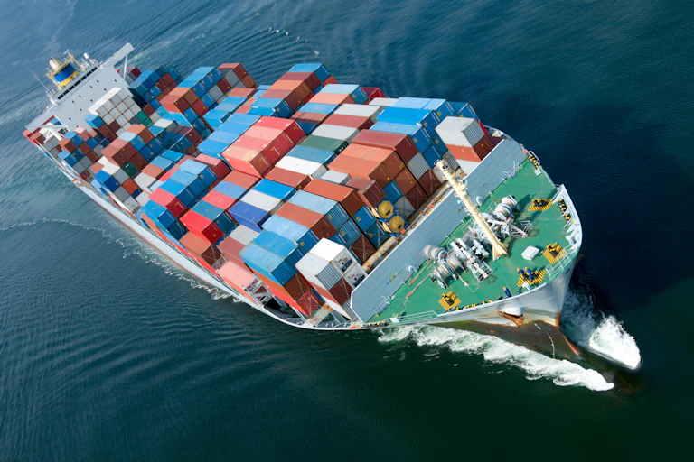 Container ship moving through the sea