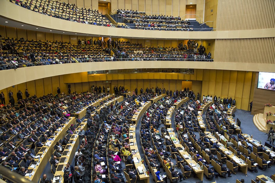 A large hall filled with African leaders