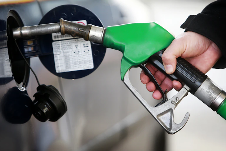 A car being filled up at a petrol station.