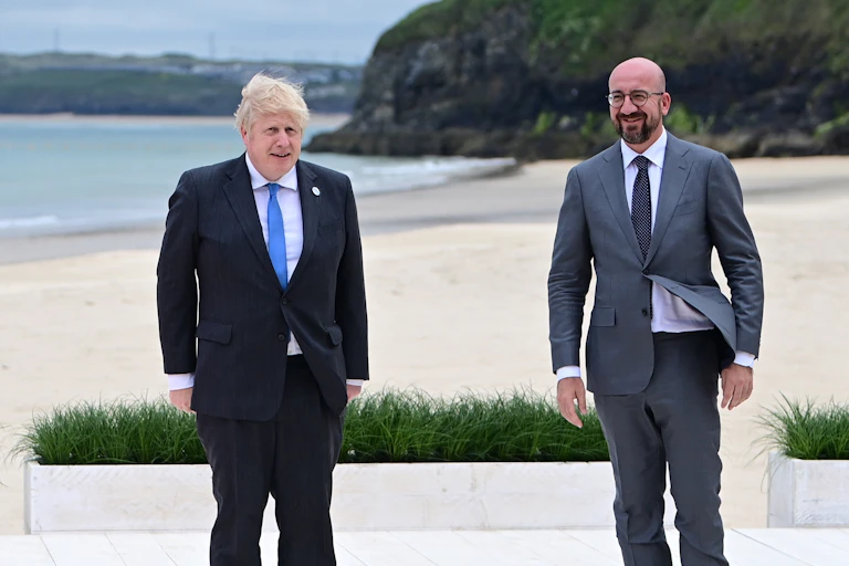Boris Johnson and Charles Michel on a windy beach in Cornwall ahead of the G7 summit.