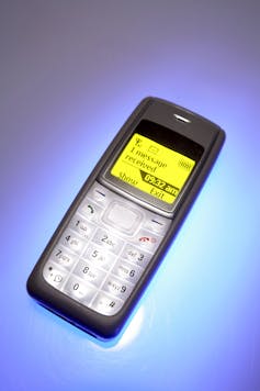 A basic mobile phone indicating a message received