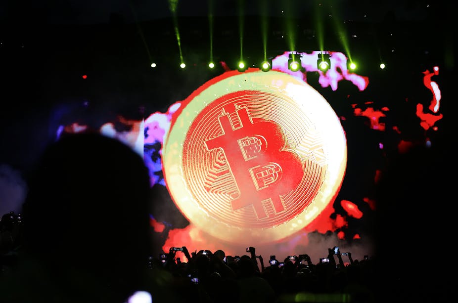Projection of Bitcoin symbol on a stage in El Salvador. 