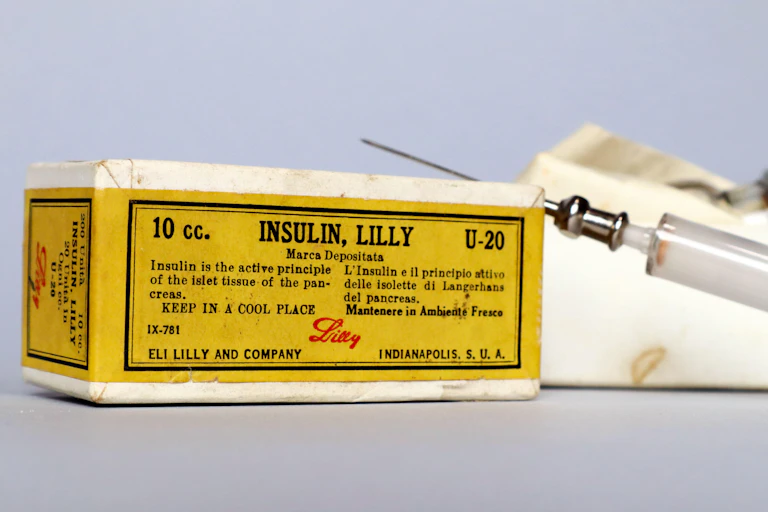 Box of insulin with needle.