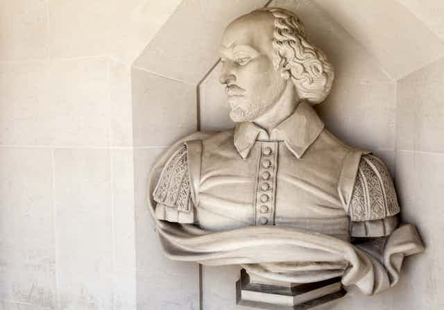 A bust sculpture of Shakespeare on the wall of the Guildhall in London.