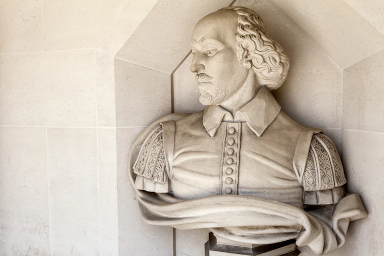 A bust sculpture of Shakespeare on the wall of the Guildhall in London.
