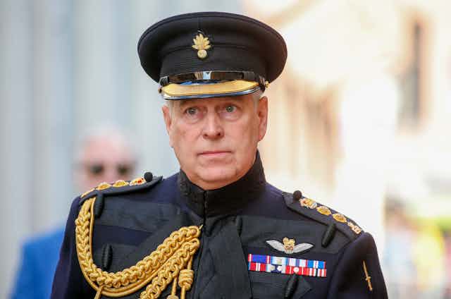 Prince Andrew in darkly coloured military dress