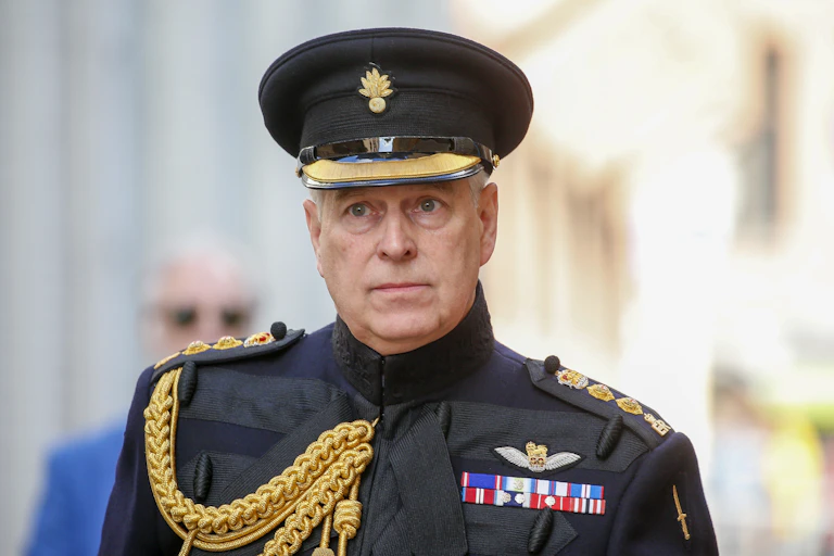 Prince Andrew in darkly coloured military dress