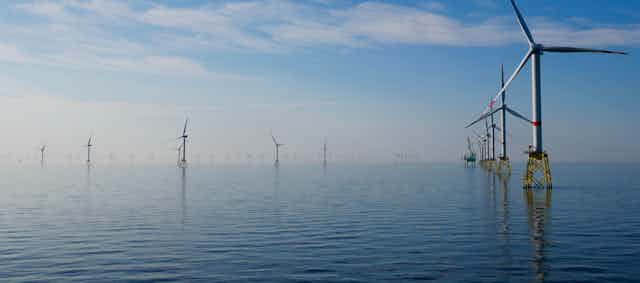 Wind turbines on a calm sea