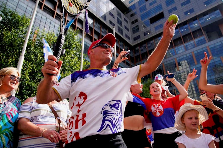 Fans of Serbian tennis player Novak Djokovic show their support for his legal battle over his visa to enter Australia.