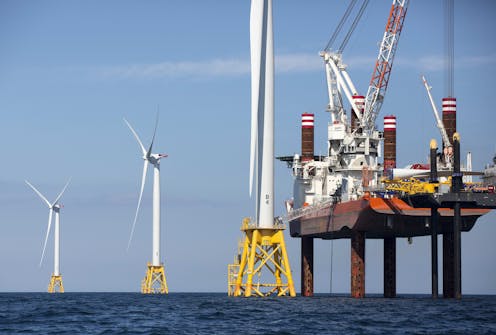 Offshore wind farms could help capture carbon from air and store it long-term, saving money – a geophysicist explains how