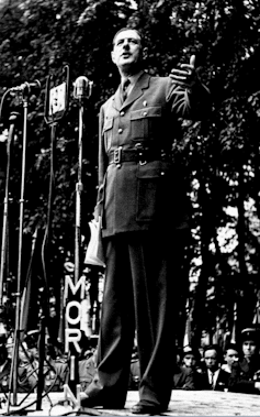 Black and white photograph of Charles de Gaulle delivering a speech