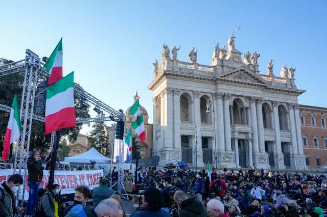 Italians in Rome protest against a new vaccine mandate.