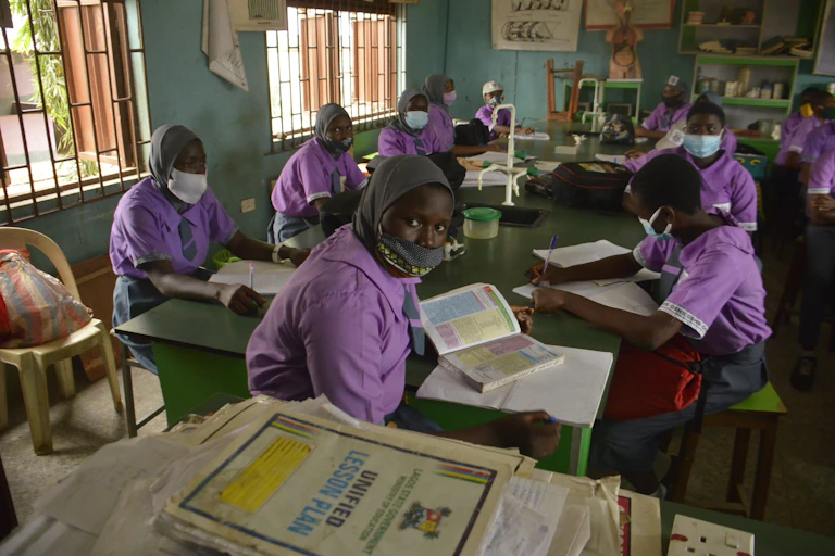 Students of Oregun Senior High School resume class on their first day of resumption amid the coronavirus pandemic, in Lagos, Nigeria.