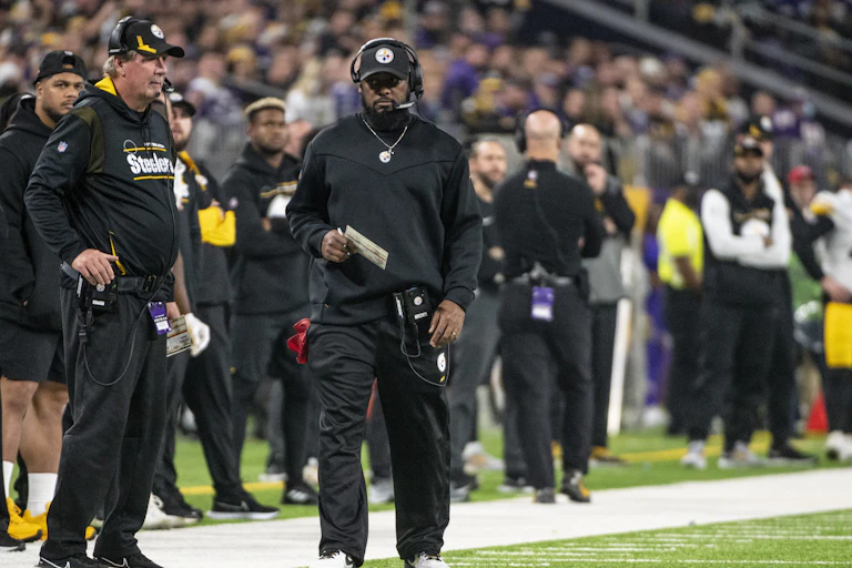 Head Coach Mike Tomlin walks the sidelines during recent game.