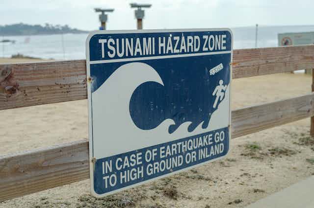 A sign warning about tsunami hazards.