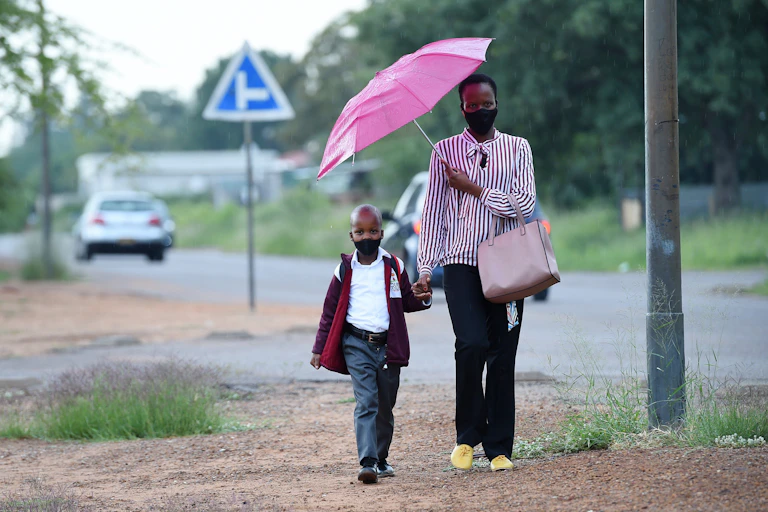 Woman walking with child