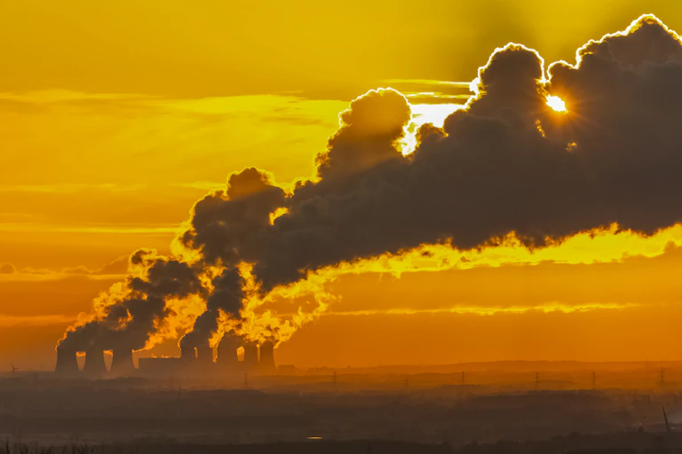 Power station smoke hiding the sun