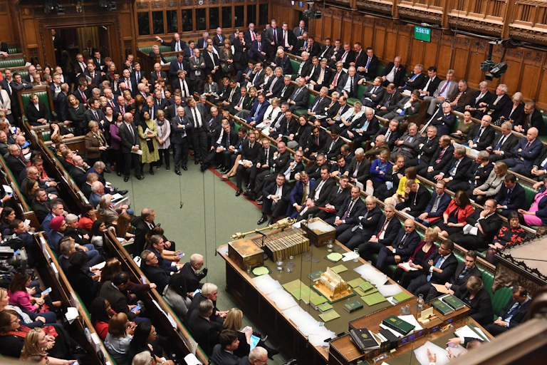 MPs sitting in the House of Commons chamber