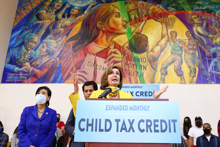 Nancy Pelosi speaks at a press conference about the child tax credit.