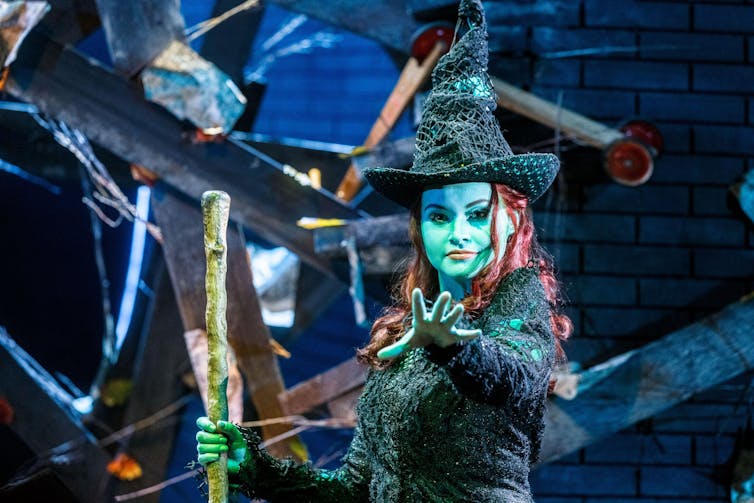The singer Vajen van den Bosch stands as Elphaba during a photo rehearsal for Wicked on stage at the Stage Theater Neue Flora in Hamburg