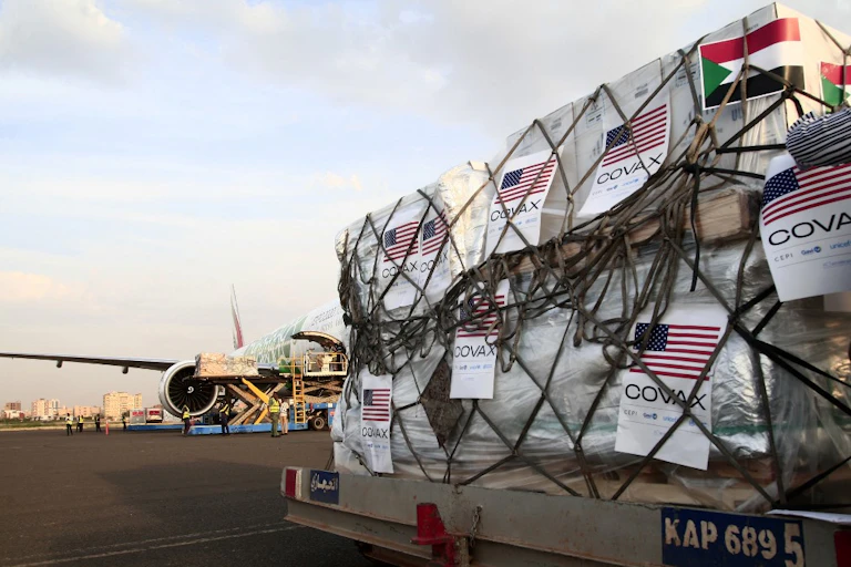 A shipment of Covid vaccines sent to Sudan by the Covax vaccine-sharing initiative, are unloaded in the capital Khartoum, October 6, 2021.